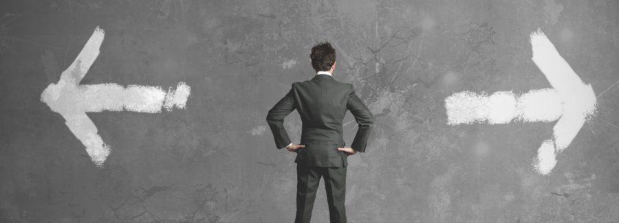 Businessman in front of a choice