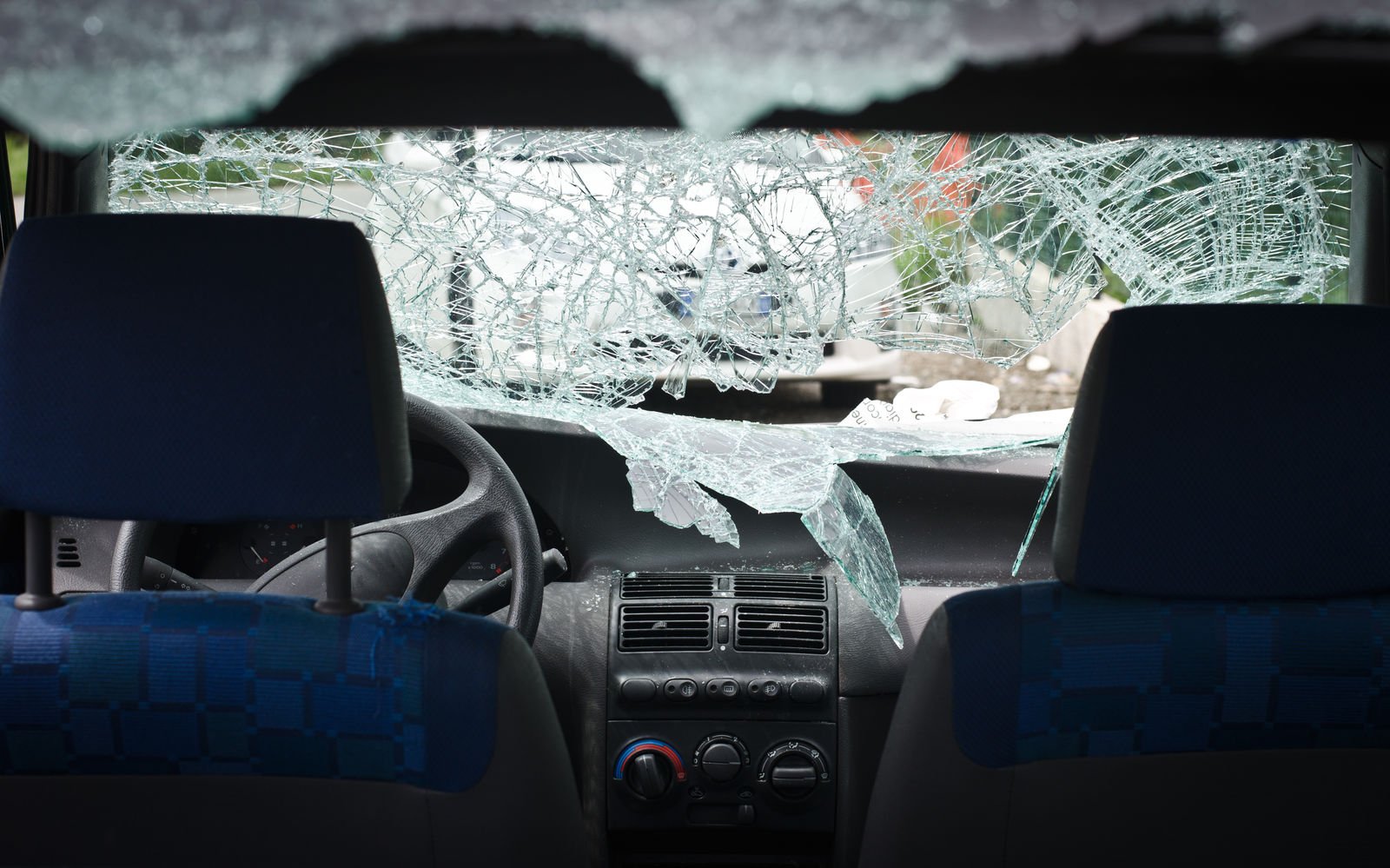 shattered windshield from view inside of the a car