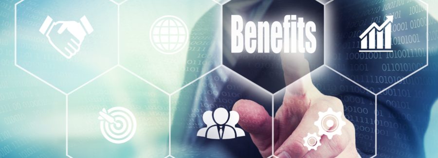 Businessman pressing an Benefits concept button.